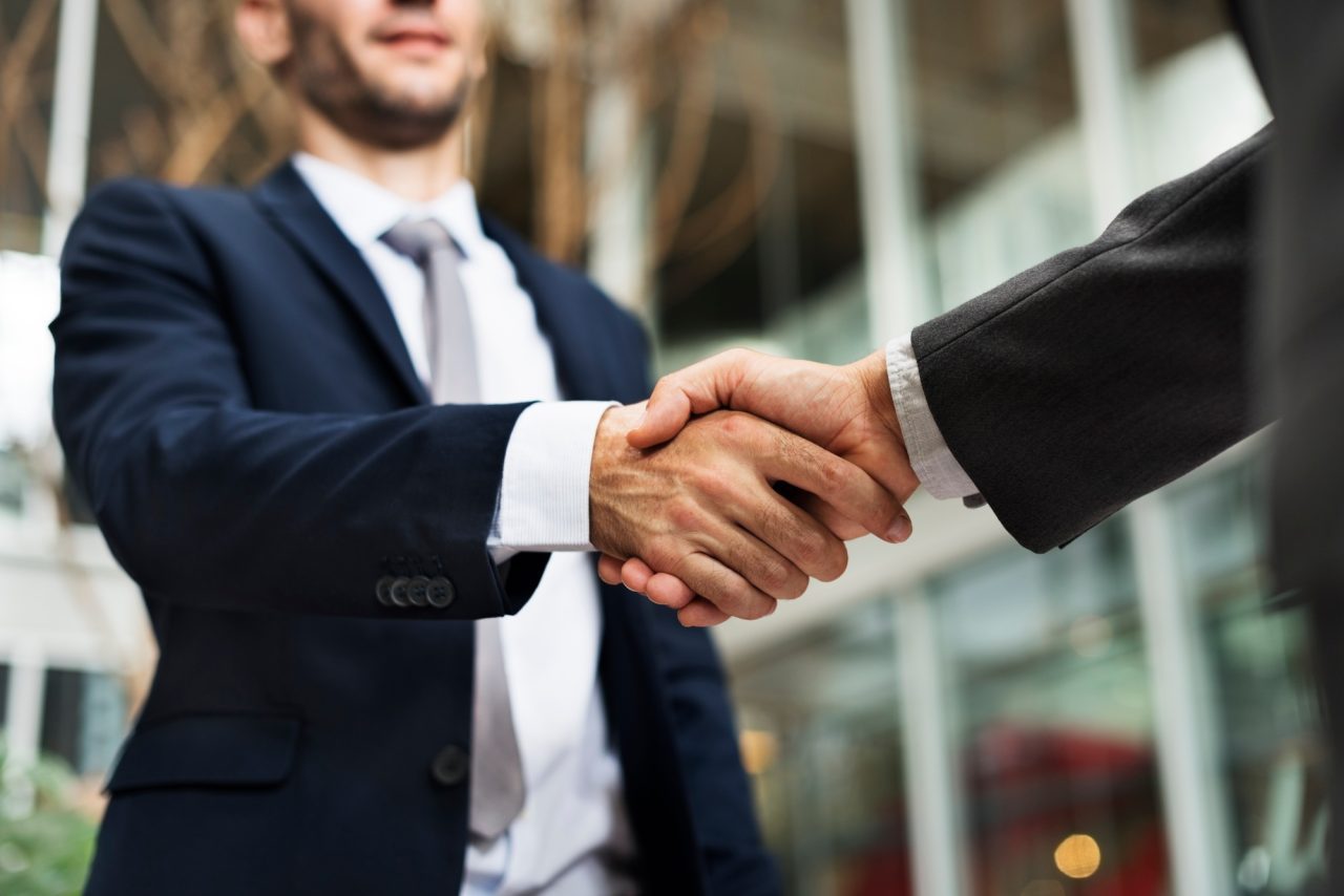 business handshake deal greeting concept